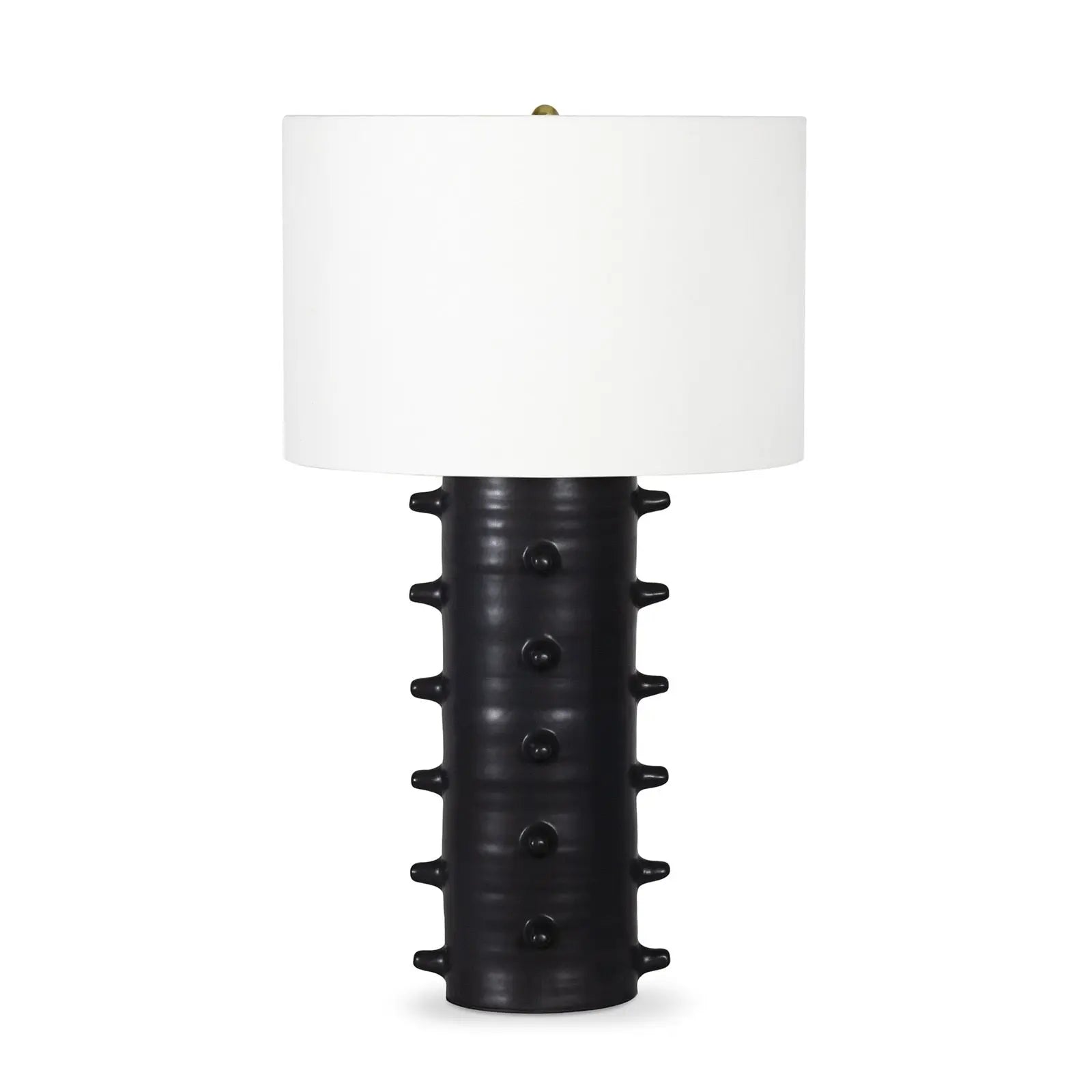 Black textured table lamp with a white shade on a white background