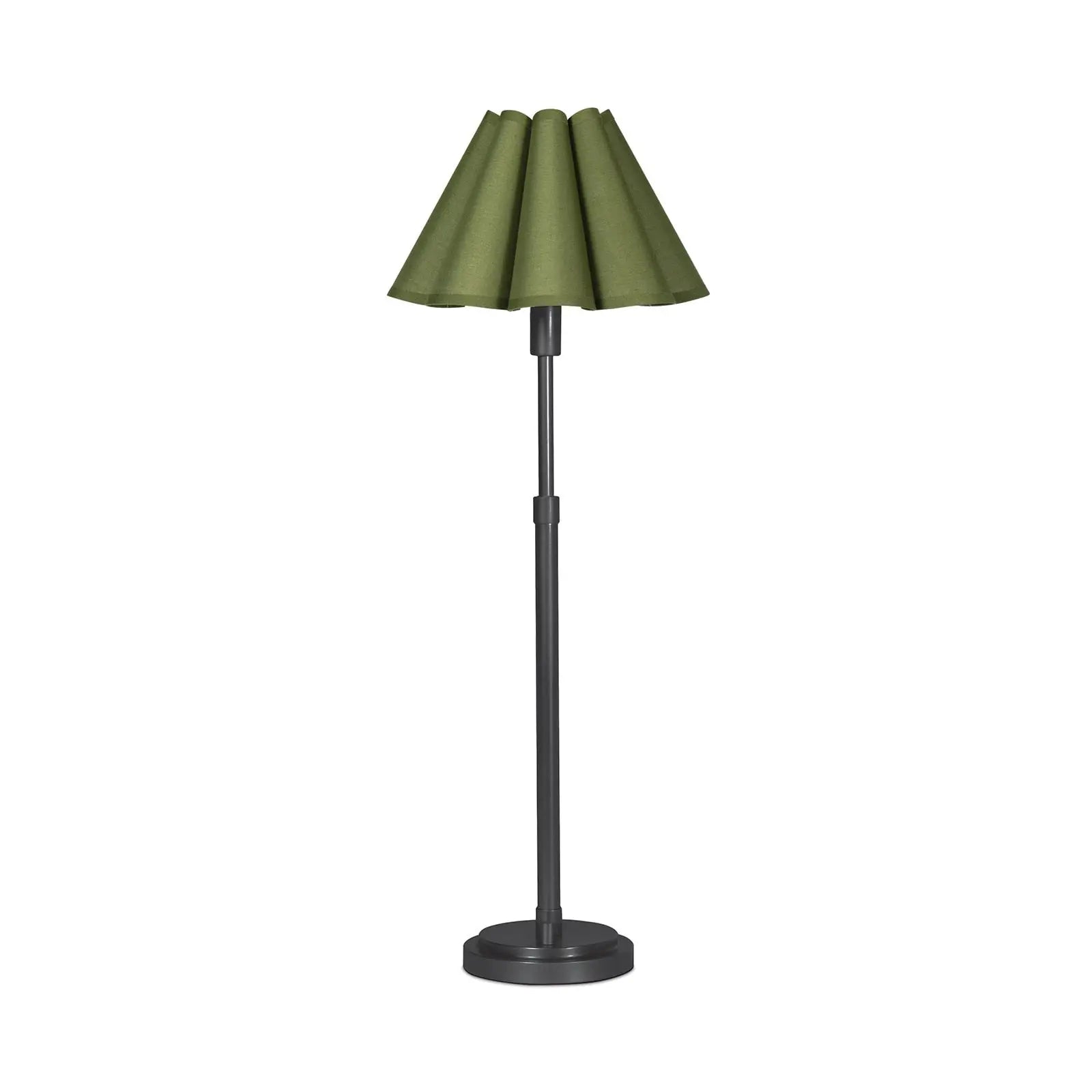 Green lamp with pleated shade on a white background