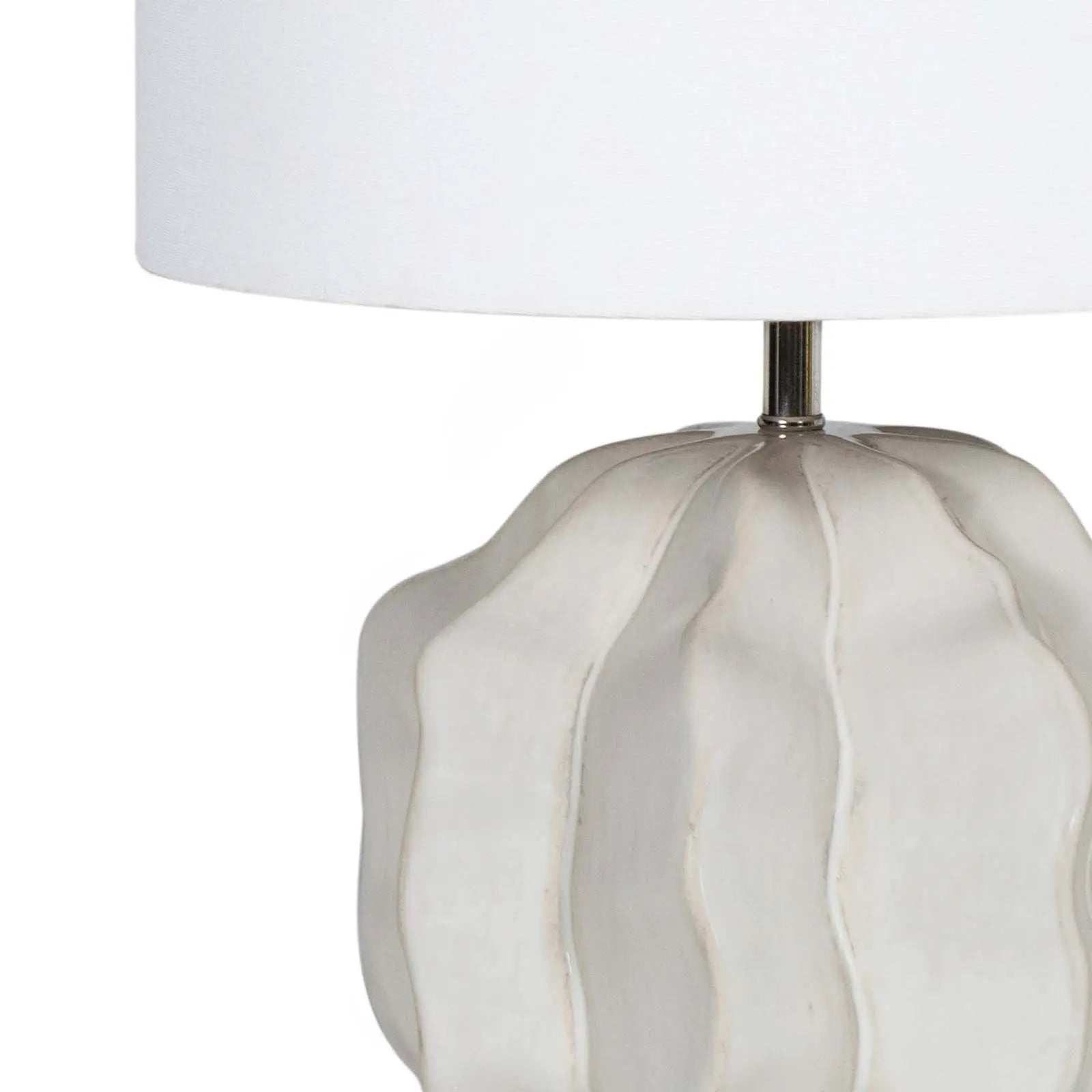 Destin Ceramic Mini Lamp (20.25" H) with an ivory ceramic base featuring a geometric wave pattern and a light natural linen shade.