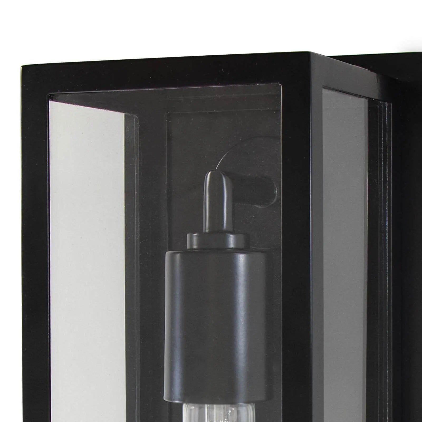 Black outdoor wall light fixture with clear glass panels on a white background