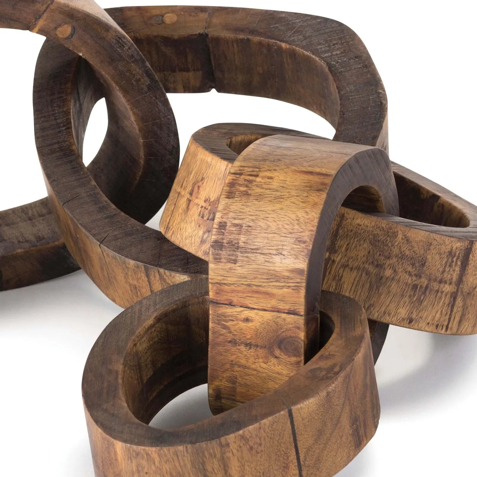 Wooden interlocking rings on a white background