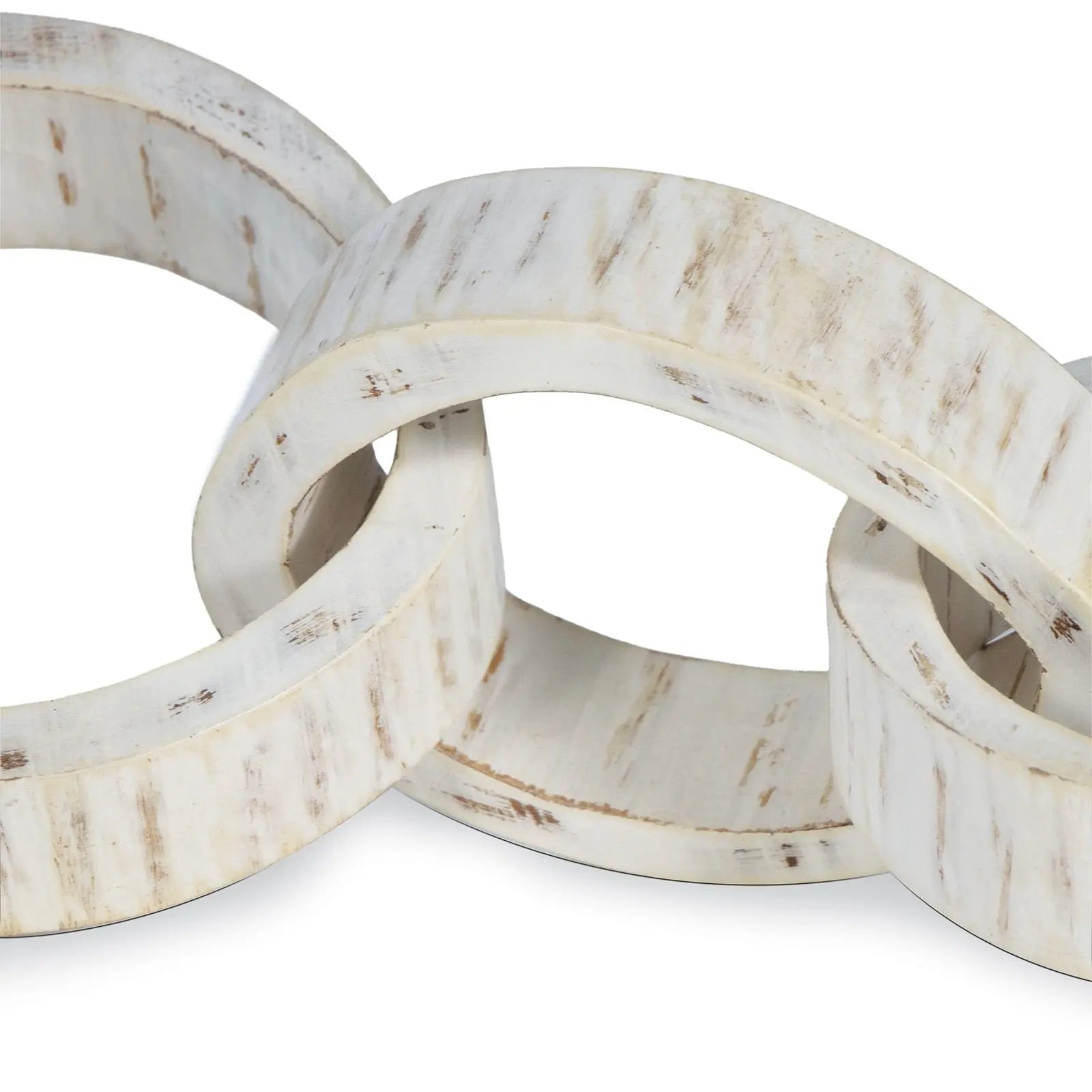 Set of three white wooden rings stacked on a white background