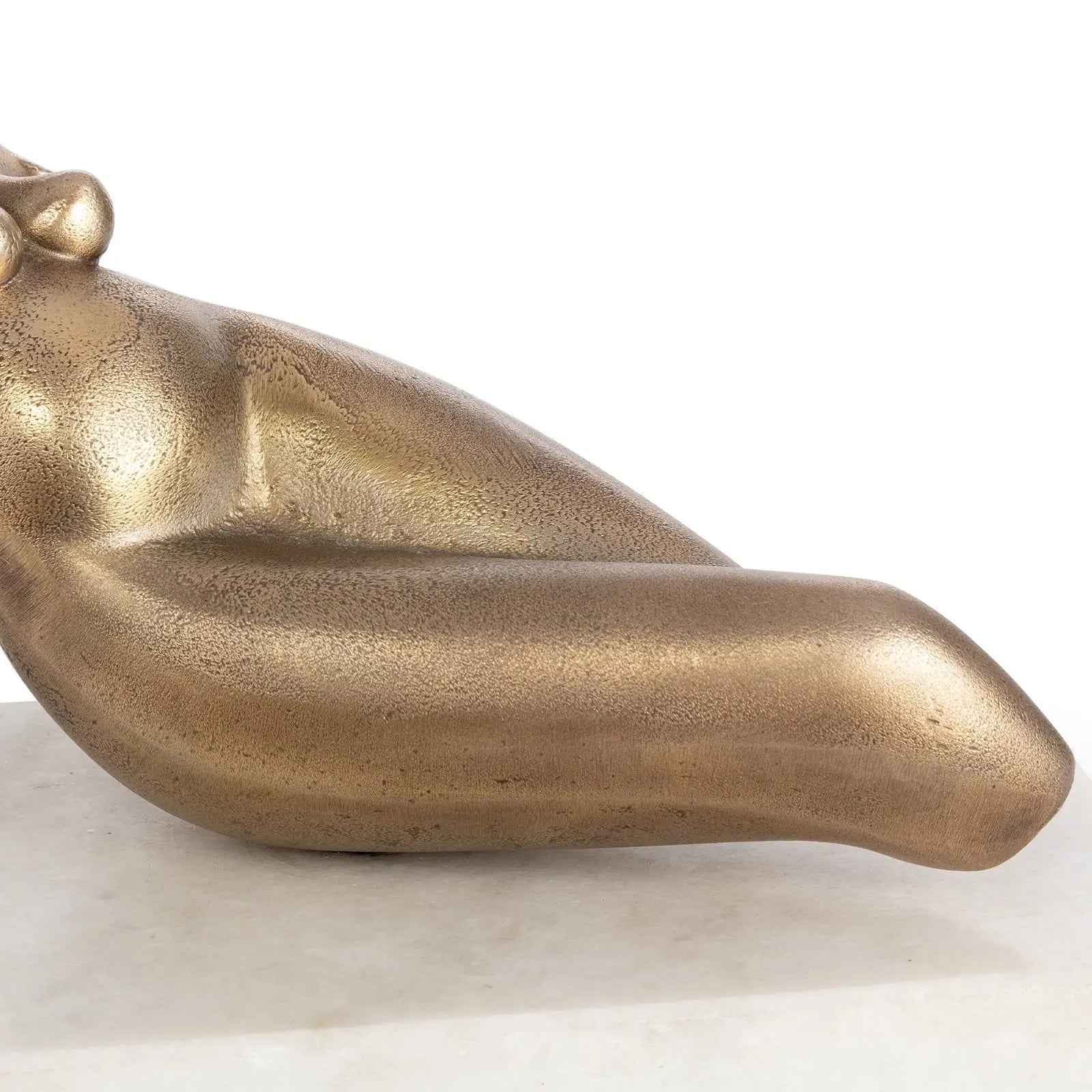 Bronze sculpture of a hand on a white background
