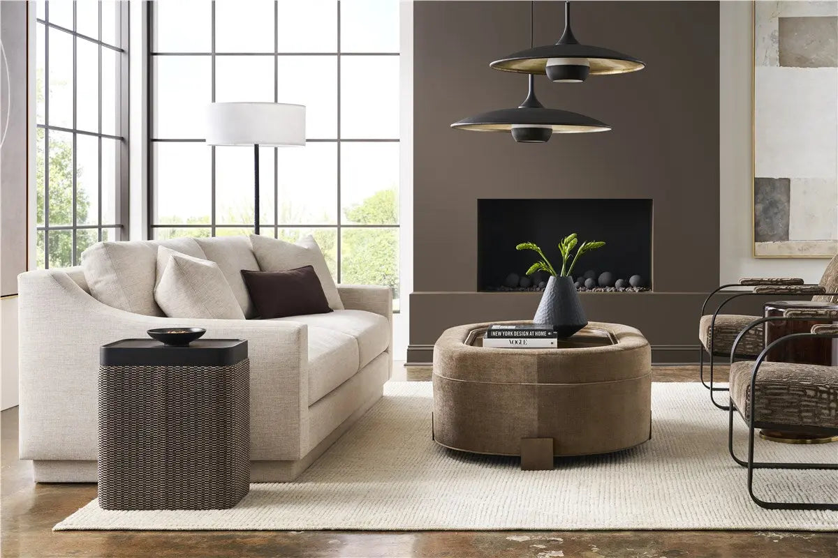 A long, sophisticated 94-inch Asher Sofa with softly sloped arms and a fully upholstered base in a light gray Thriller Linen performance fabric.