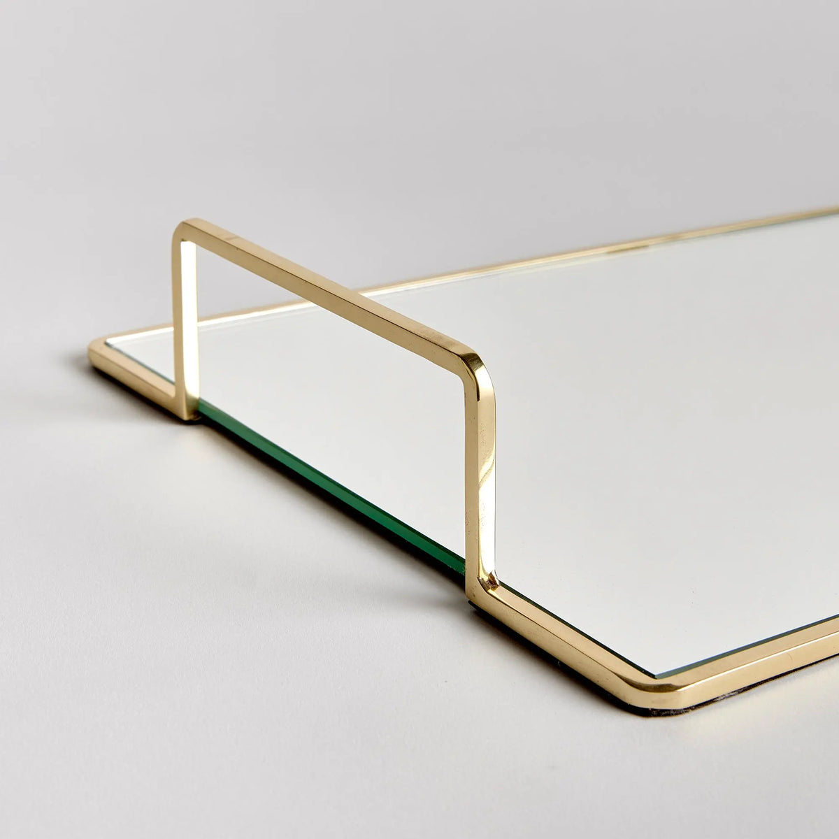 Covina small gold-tone mirrored tray, angled view