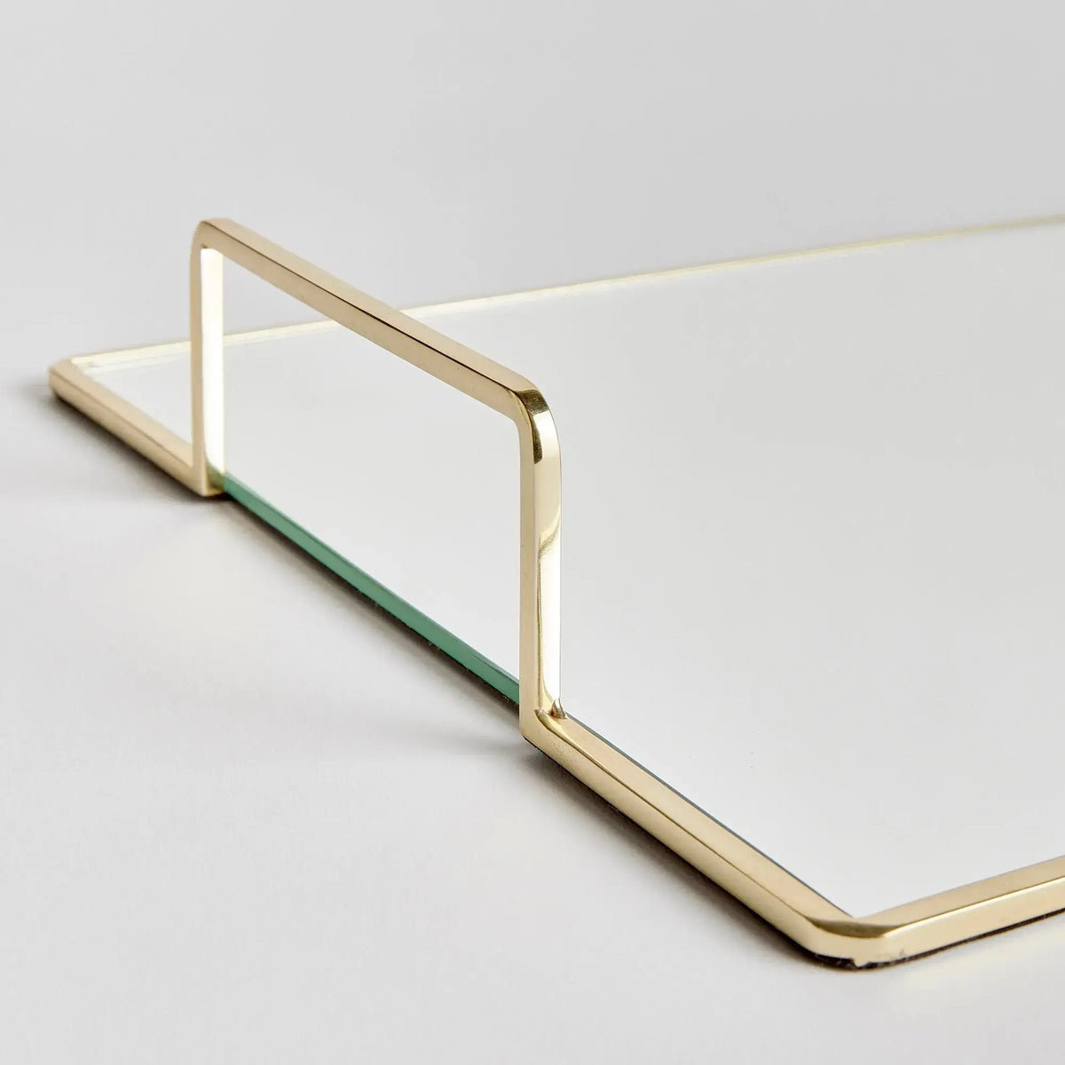Covina large gold-tone mirrored tray, angled view