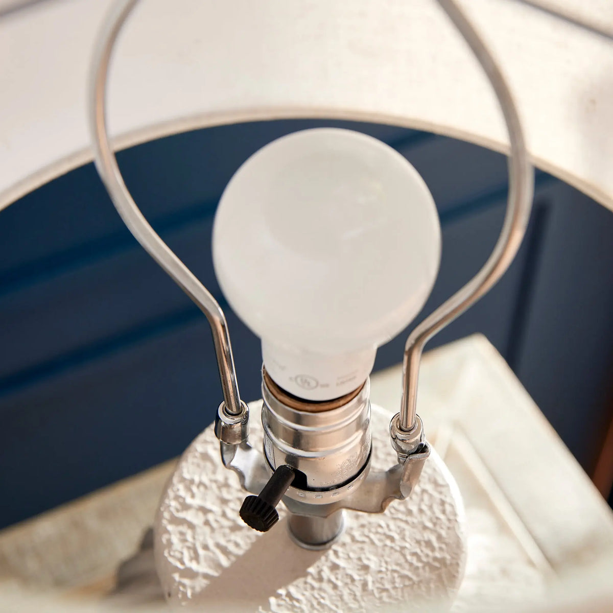 Close-up of the lamp socket and light bulb