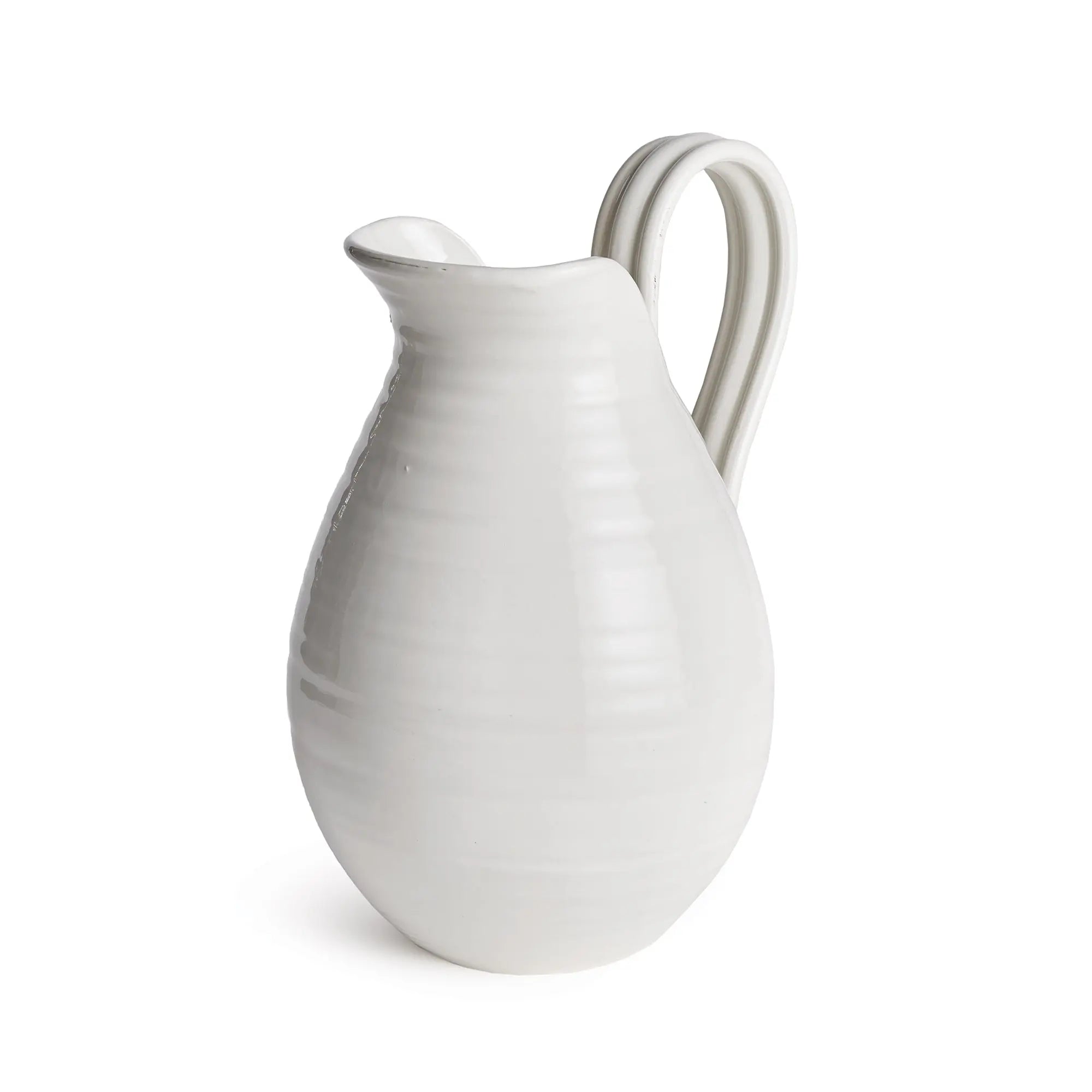 White ceramic pitcher on a white background