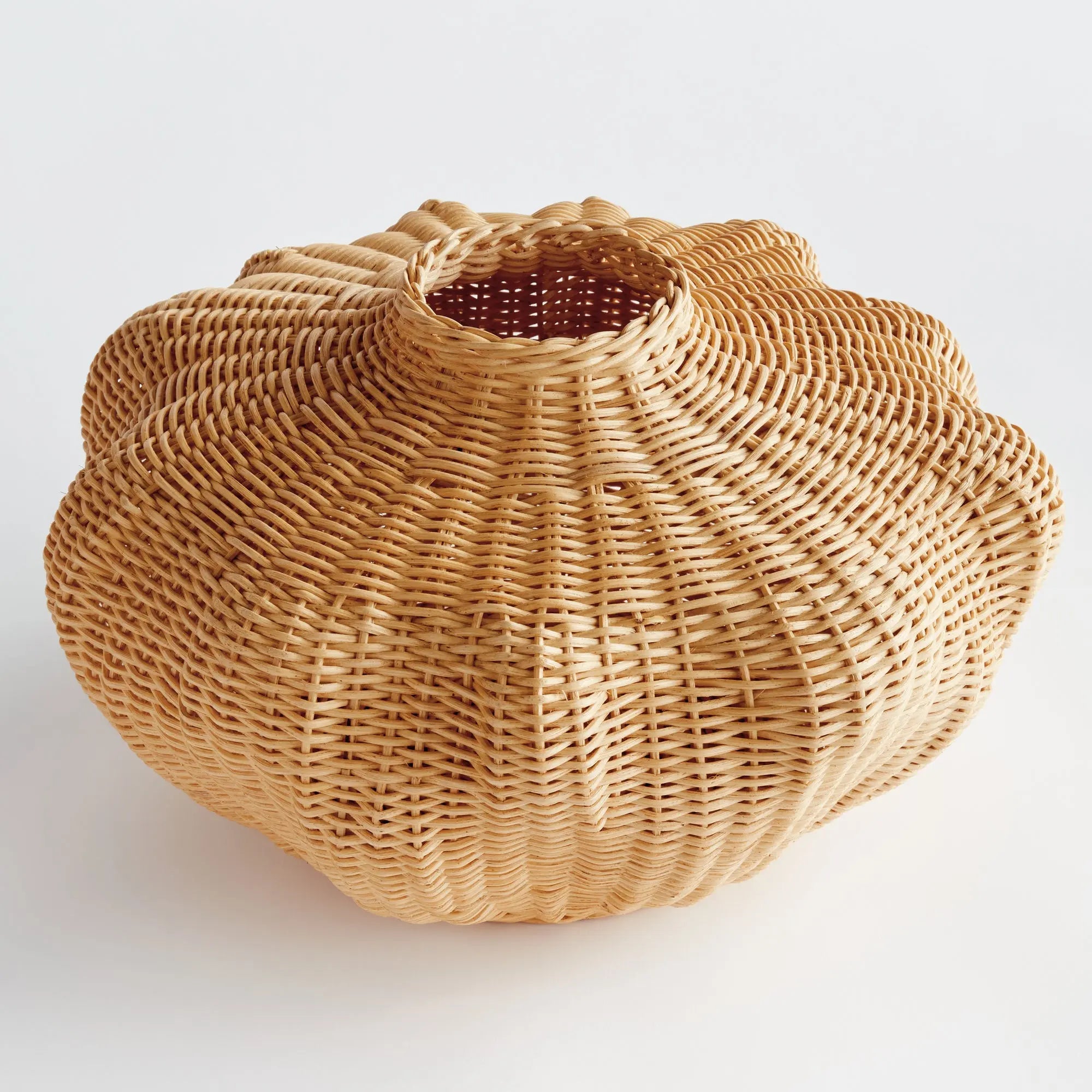 Handwoven short rattan vase with sculptural shape