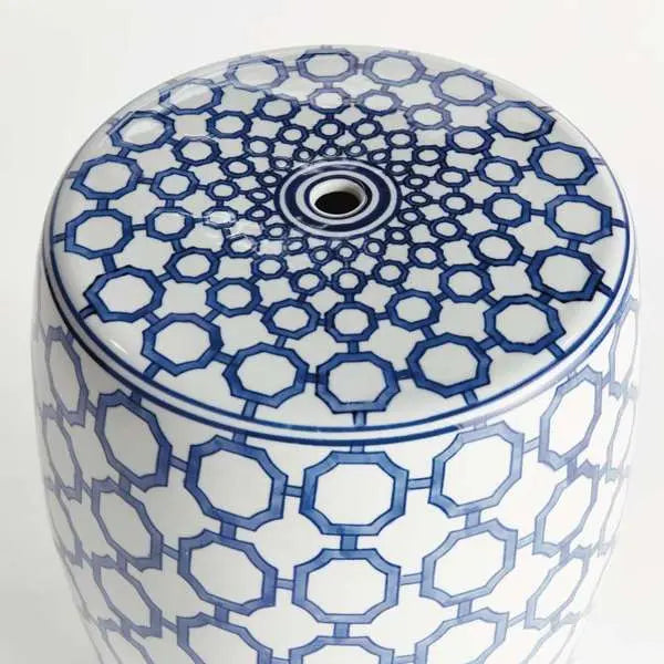 Barclay Butera Dynasty Link Stool, showing a blue and white ceramic stool with a classic chinoiserie-inspired link pattern. The stool is cylindrical and is shown against a plain background to highlight its intricate design.