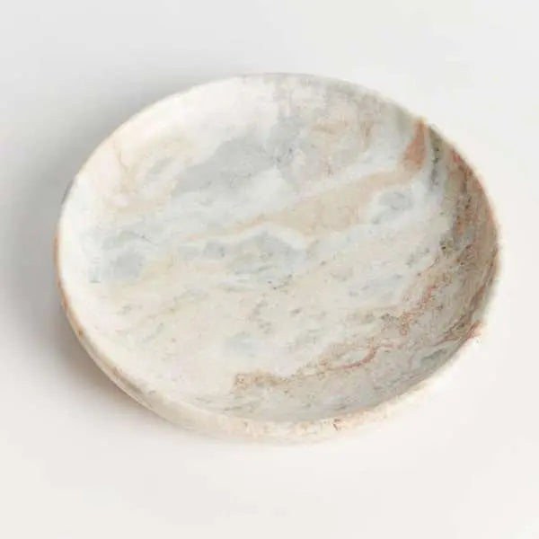 Round Josephine Marble Tray with a flat surface and low rim, featuring distinctive broad brown and light brown veins on a white marble base with a honed finish.