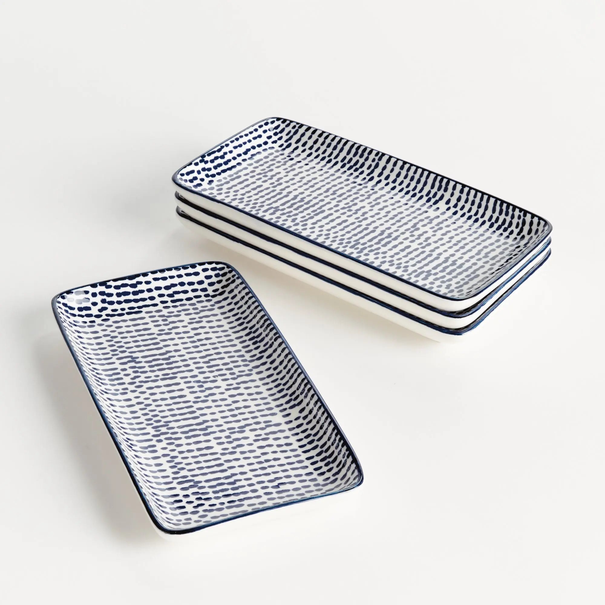 Stria Speckled 8" Trays Set of 4 - dark blue and white ceramic serving trays with speckled pattern for appetizers and entertaining