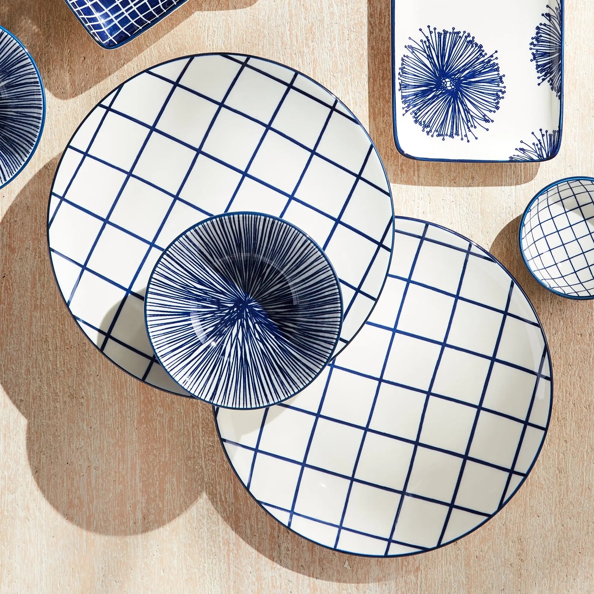 Stria 8.5" Plates Set of 4 - dark blue and white ceramic salad plates with modern grid pattern for dining and entertaining