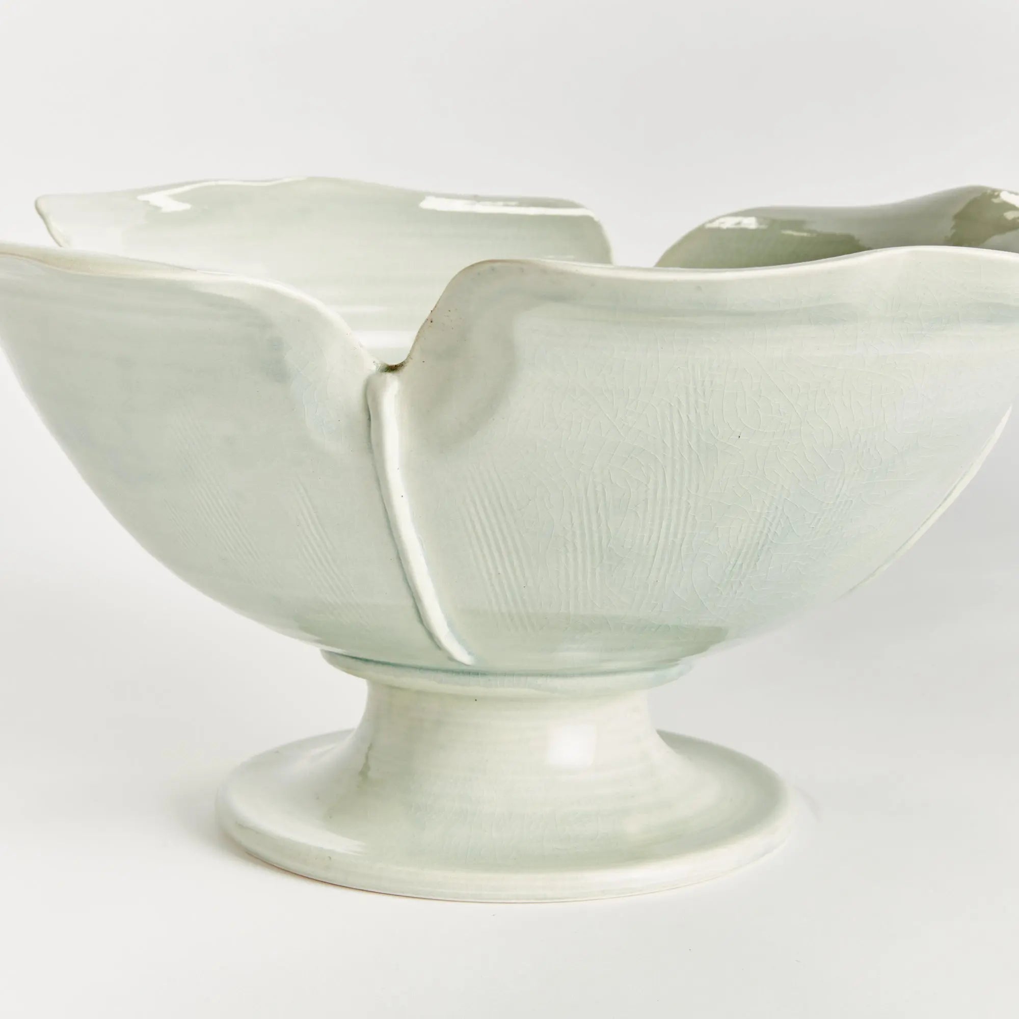 Handmade ceramic footed bowl with petal design in celadon glaze