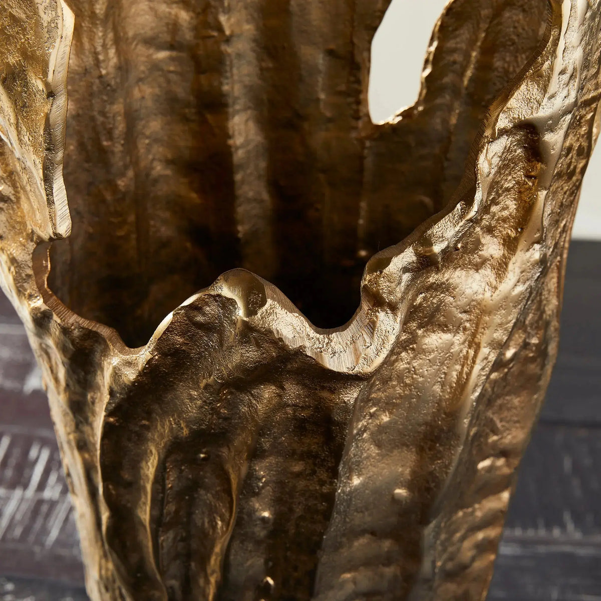 Close-up of the Arbre vase's textured cast aluminum surface