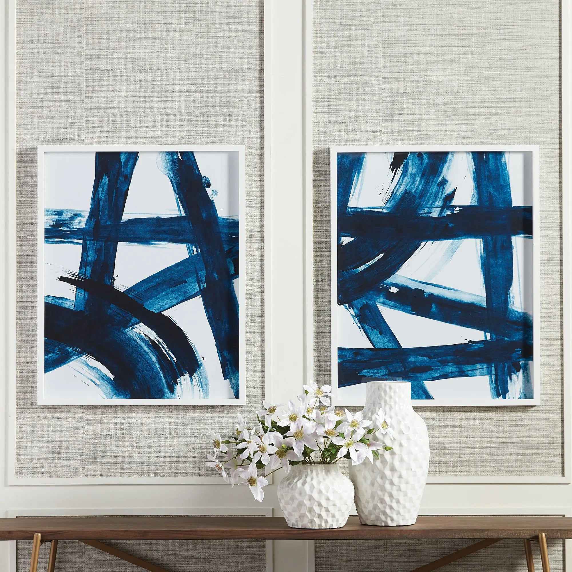 Set of 2 indigo abstract prints in natural wood frames with white background