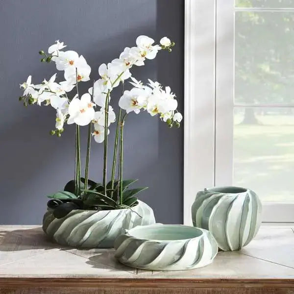 Realistic drop-in stems and everlasting botanicals for easy home styling.
