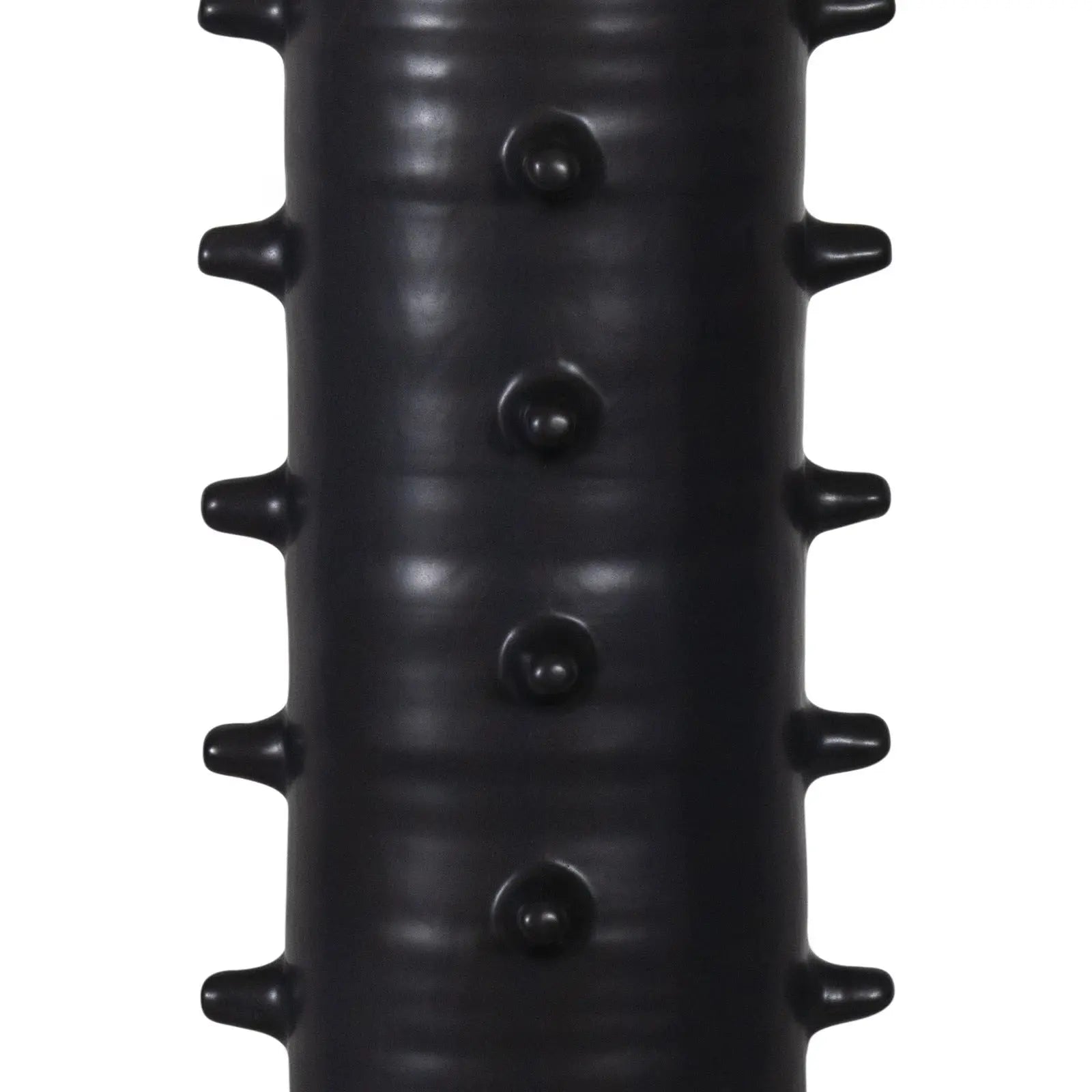 Black textured object on a white background