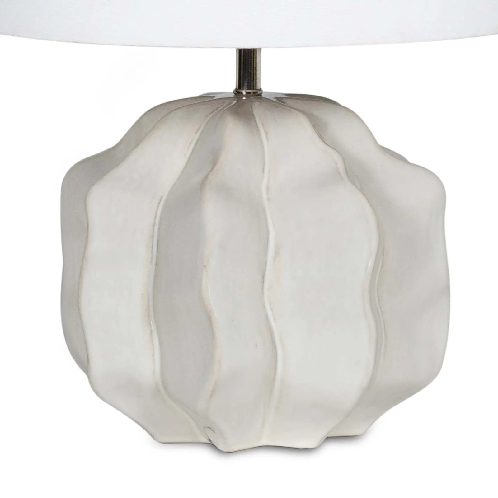 Destin Ceramic Mini Lamp (20.25" H) with an ivory ceramic base featuring a geometric wave pattern and a light natural linen shade.