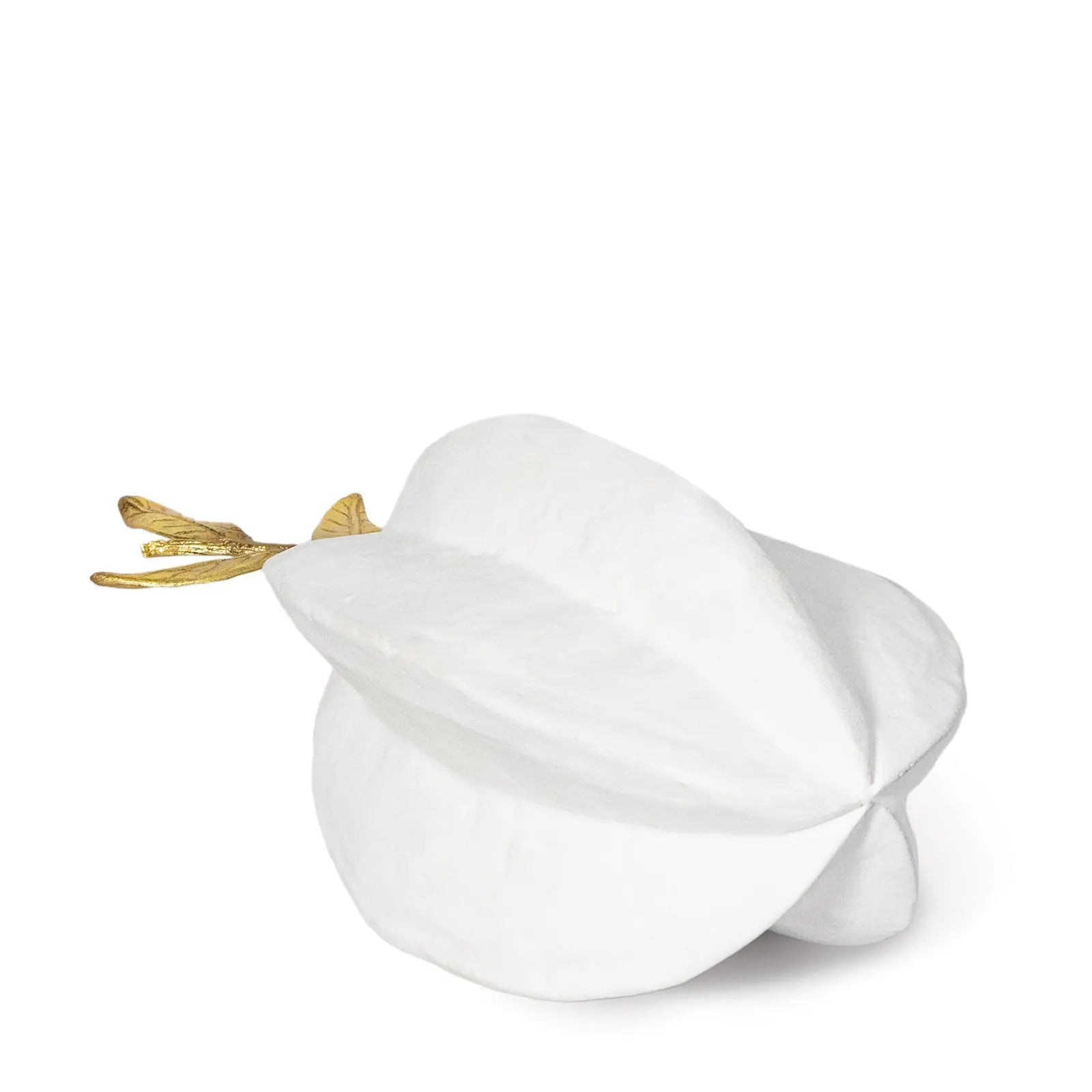White ceramic sculpture with gold accents on a white background