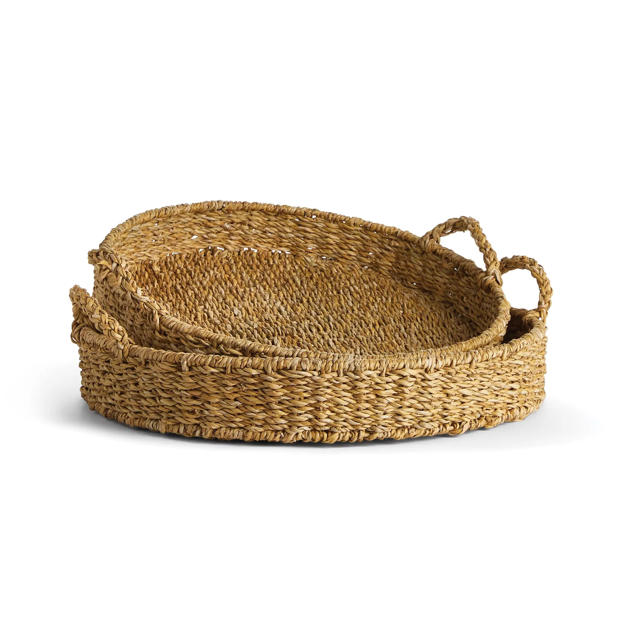 Set of two woven baskets with handles on a white background