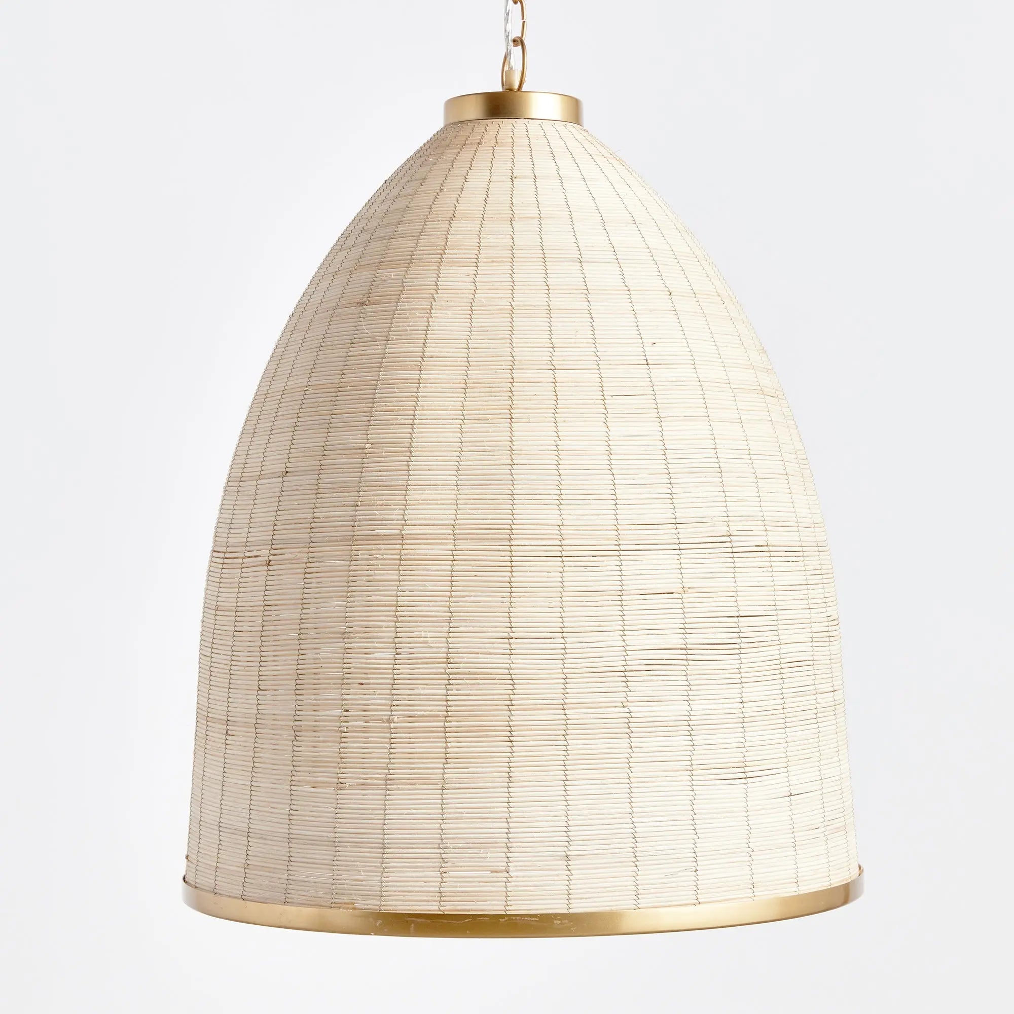 Maye Bell Pendant made of whitewashed rattan with brass accents
