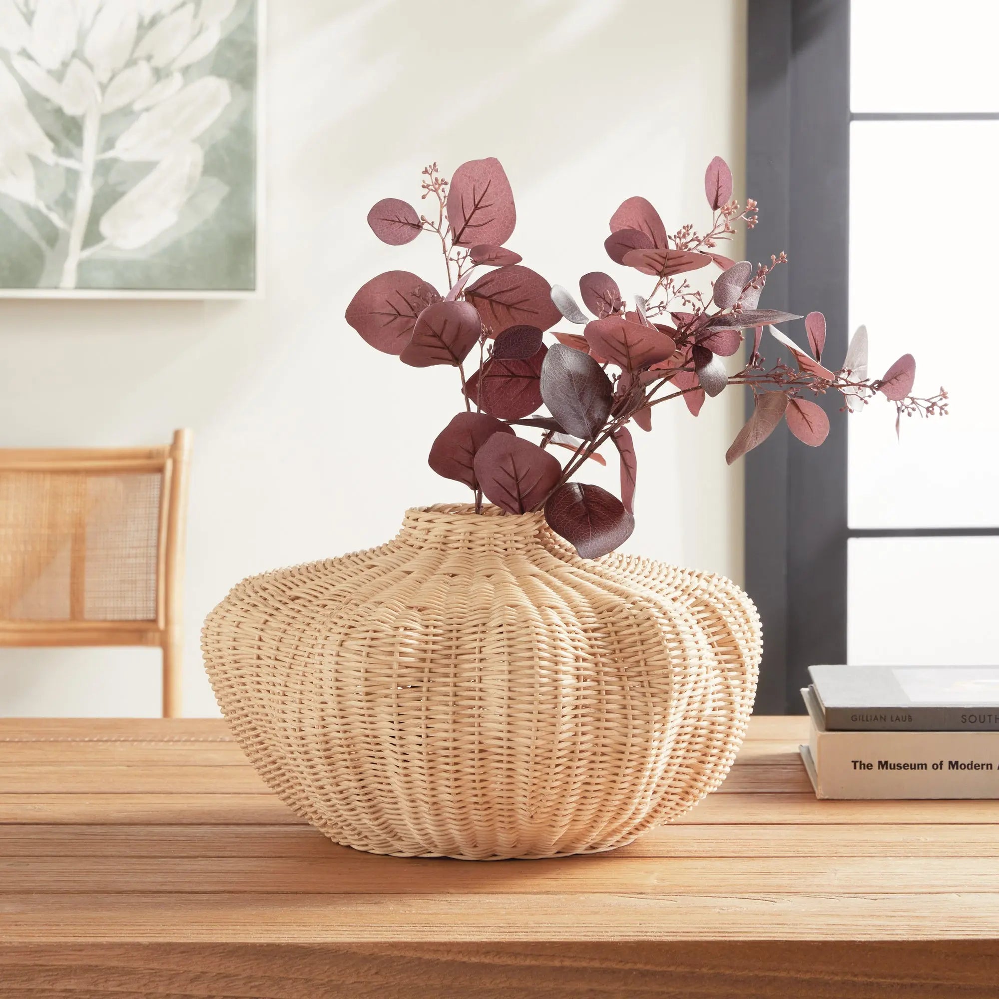Handwoven short rattan vase with sculptural shape