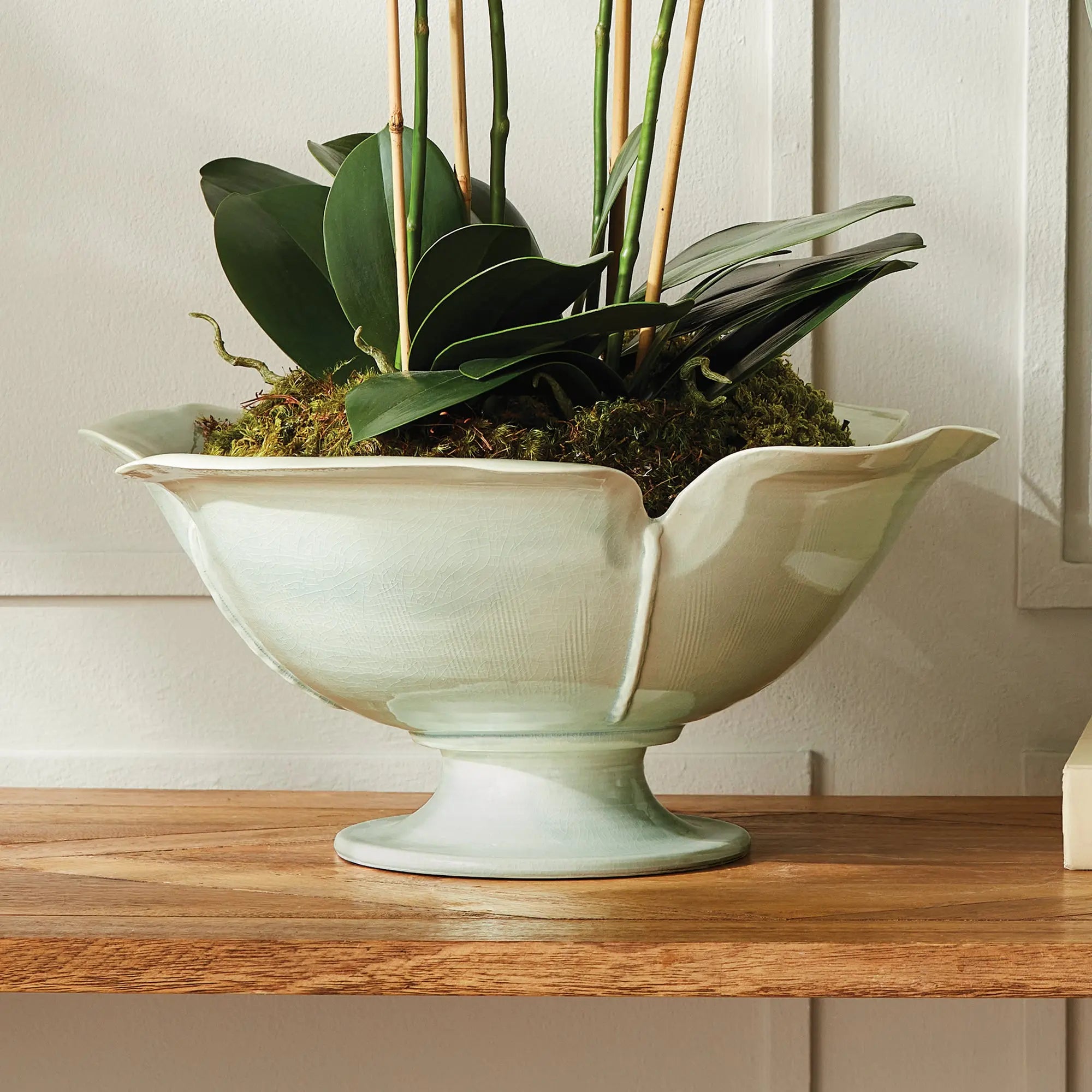 Handmade ceramic footed bowl with petal design in celadon glaze