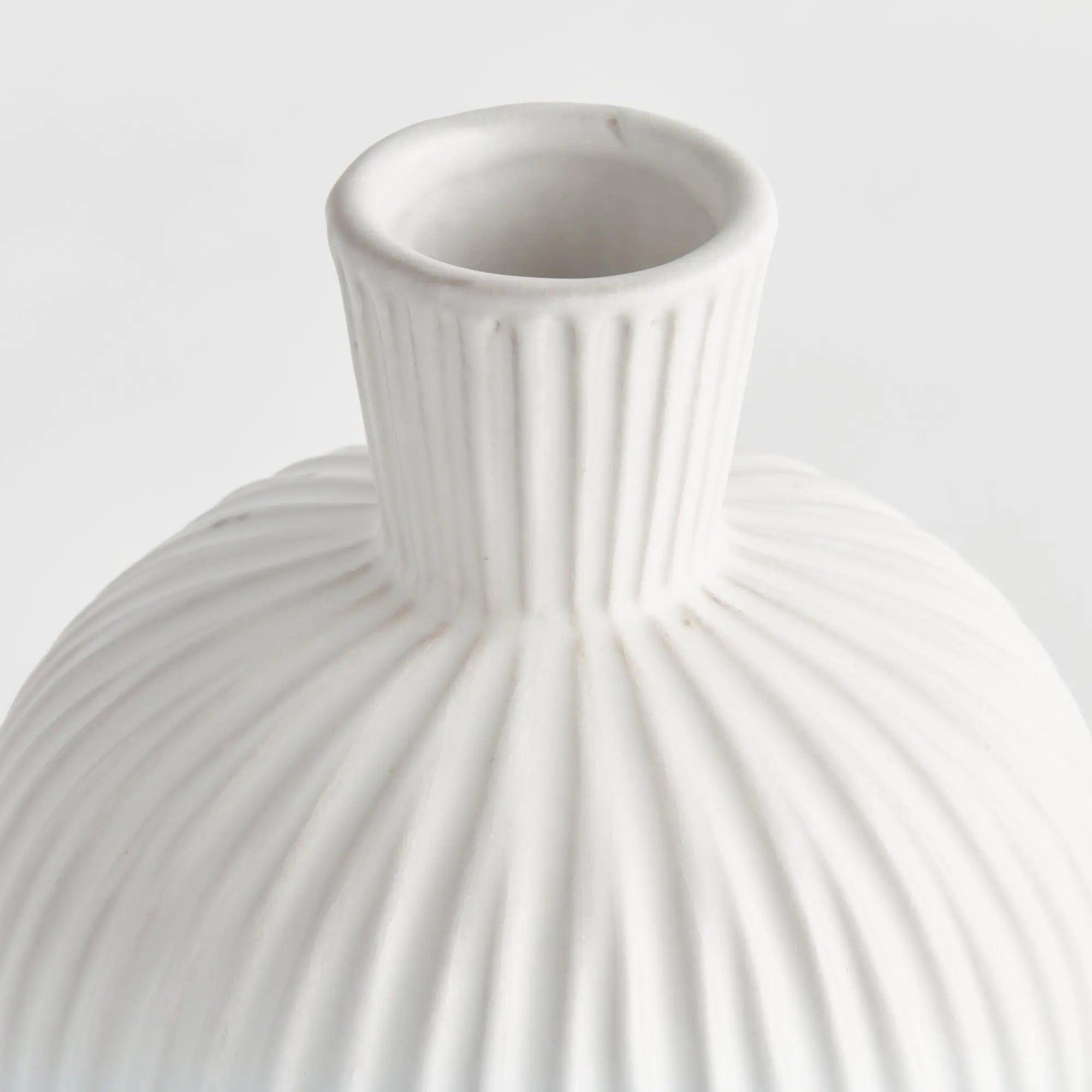 Large white ribbed ceramic Pravi Vase with bottle silhouette