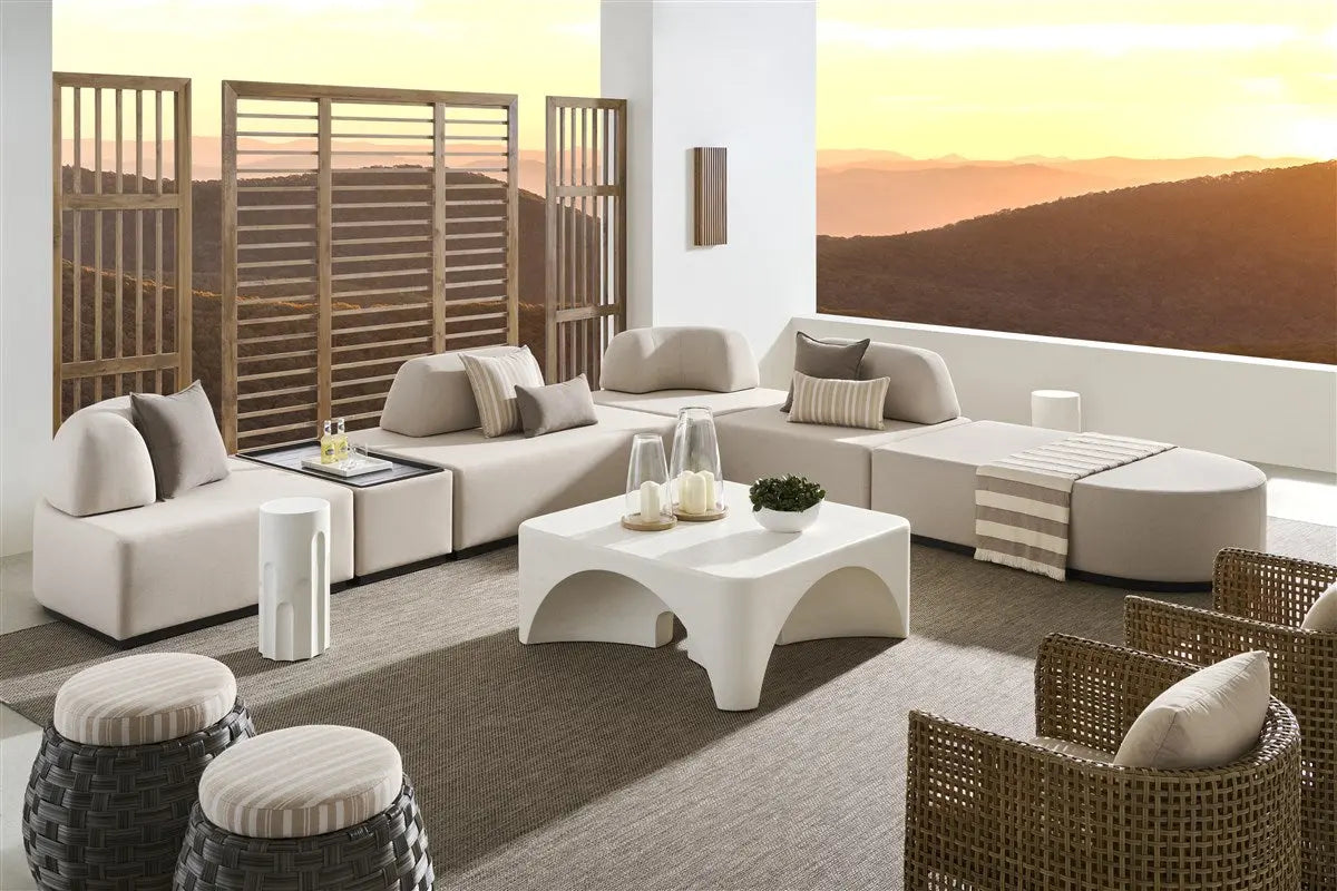 Dorian Outdoor Spot Table, a modern, compact outdoor side table with a simple design and a Stone White finish.