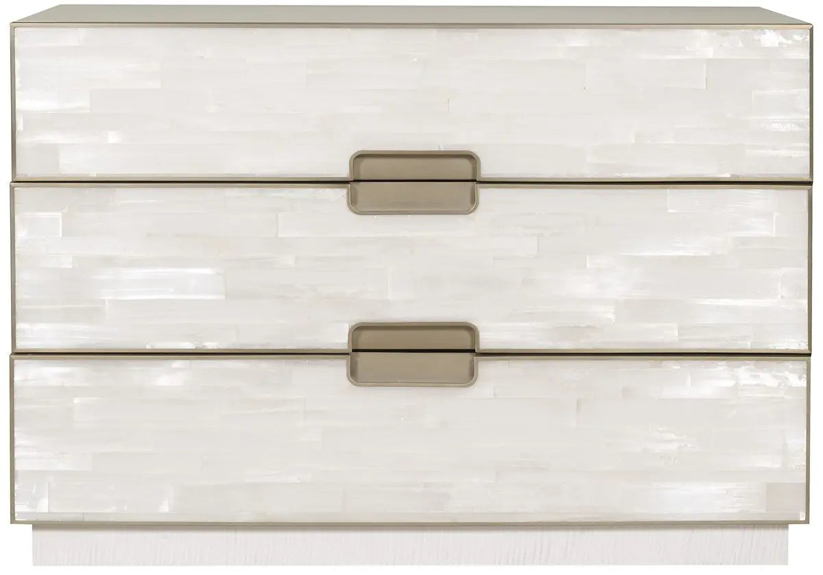 Splendor Selenite Chest, a three-drawer low dresser with drawer fronts faced in natural white selenite, a bleached maple case, and thin soft bronze metal accents.