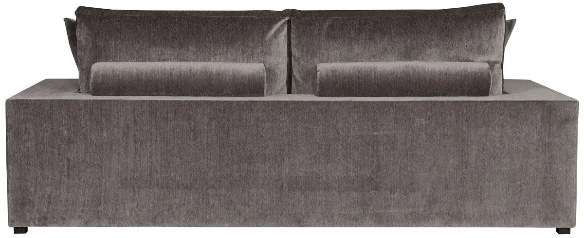 Lucca Two Seat Sofa upholstered in a dark, textured grey velvet fabric, showing its deep seats and plush back cushions.