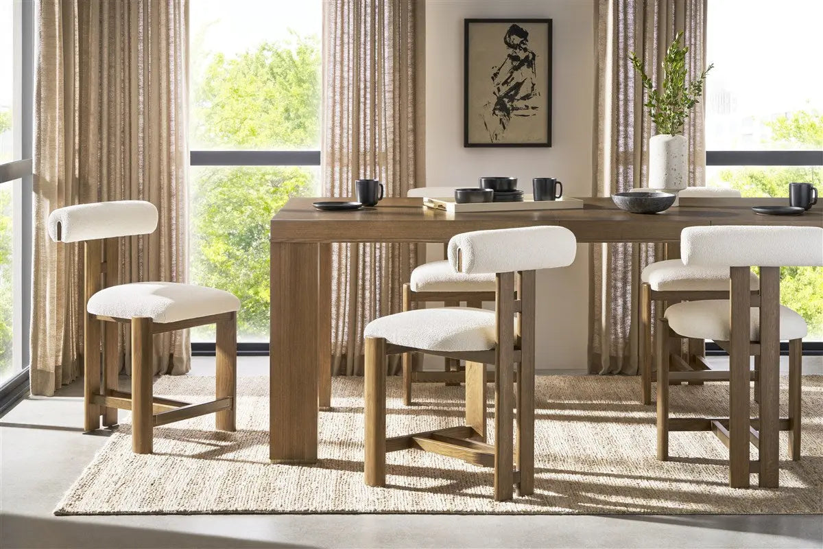 Wright Dining Counter Stool upholstered in Jackpot Chalk fabric with Saddle finish and antique brass kickplate